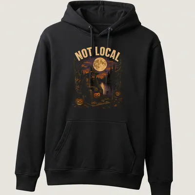 Vintage Halloween tee with cartoon Bigfoot on a dock surrounded by pumpkins — printed on a unisex hoodie