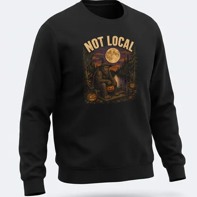 Vintage Halloween tee with cartoon Bigfoot on a dock surrounded by pumpkins — printed on a unisex sweatshirt