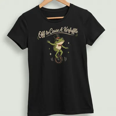 Vintage illustration of a frog riding a unicycle with humorous text above — printed on a women's shirt