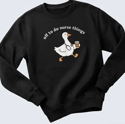 Kawaii line-art of a cheerful goose above the text 'off to do nurse things' — printed on a unisex sweatshirt