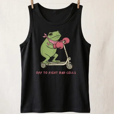 Cartoon frog on a scooter with text saying 'Off to Fight Bad Cells' in playful colors. — printed on a tank top