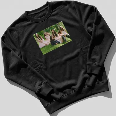 Photographic print of a young woman in a blue sweater and black boots — printed on a unisex sweatshirt