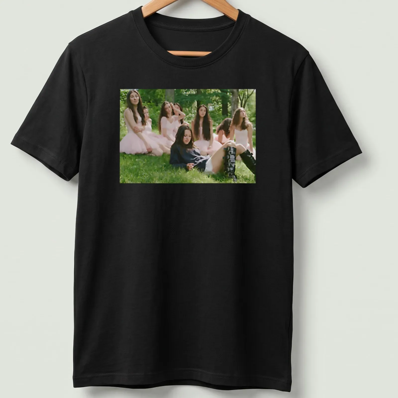 Photographic print of a young woman in a blue sweater and black boots — printed on a unisex t-shirt