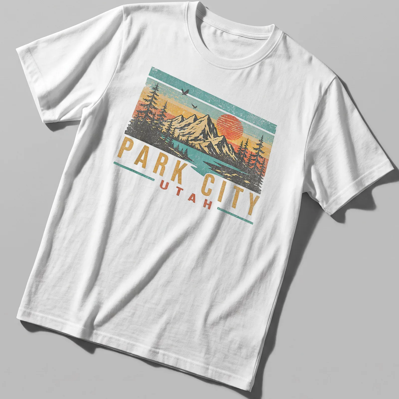 Retro distressed design featuring mountains and sunset with Park City Utah text — printed on a unisex t-shirt