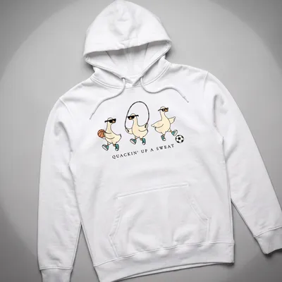 Cartoon goose with humorous text, Quackin' Up A Sweat, in vibrant colors — printed on a unisex hoodie