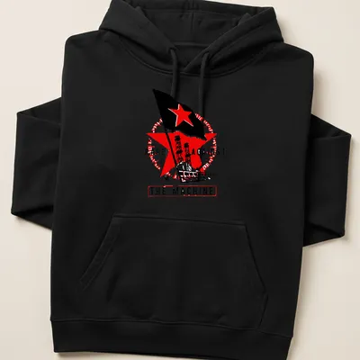 Vintage protest t-shirt with 'RAGE AGAINST THE MACHINE', red star, and industrial towers — printed on a unisex hoodie