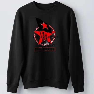 Vintage protest t-shirt with 'RAGE AGAINST THE MACHINE', red star, and industrial towers — printed on a unisex sweatshirt