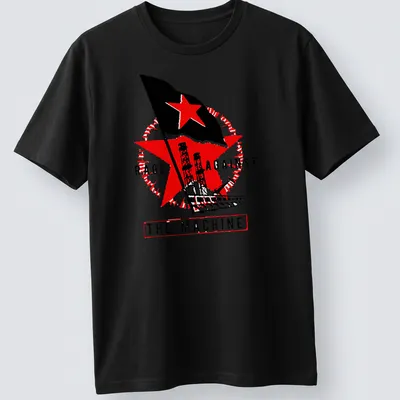 Vintage protest t-shirt with 'RAGE AGAINST THE MACHINE', red star, and industrial towers