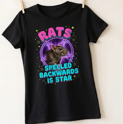 Retro tee featuring a playful rat and humorous text about wordplay — printed on a women's shirt