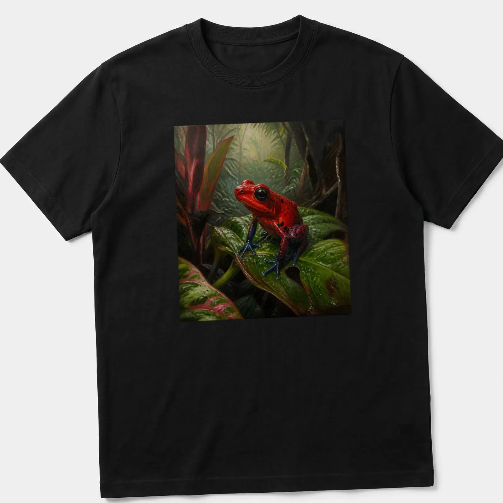 Realistic Red Dart Frog on green leaves t-shirt design — printed on a unisex t-shirt