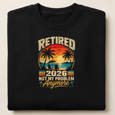 Retro sunset print of palm trees and chairs with text about retirement — printed on a unisex sweatshirt