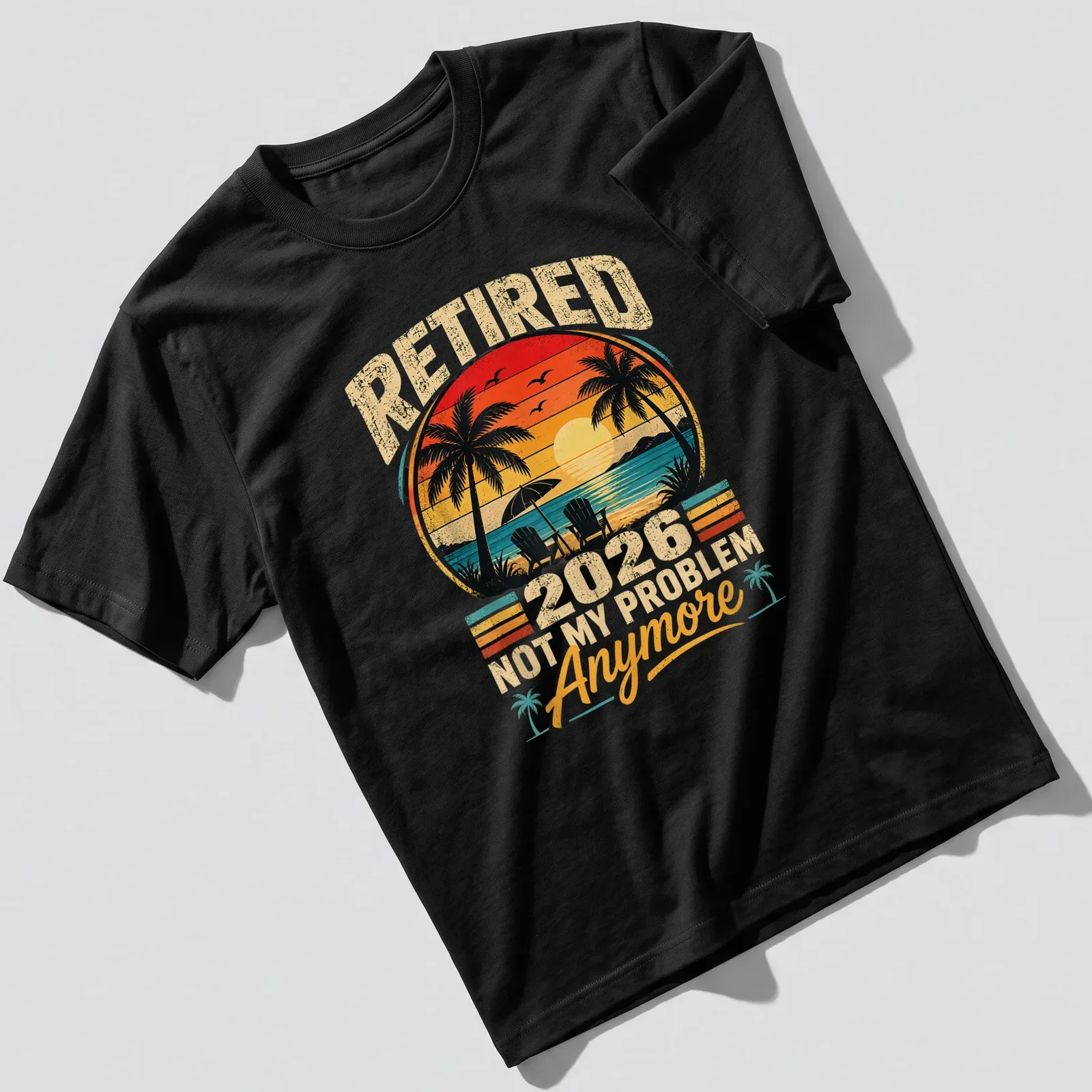 Retro sunset print of palm trees and chairs with text about retirement — printed on a unisex t-shirt
