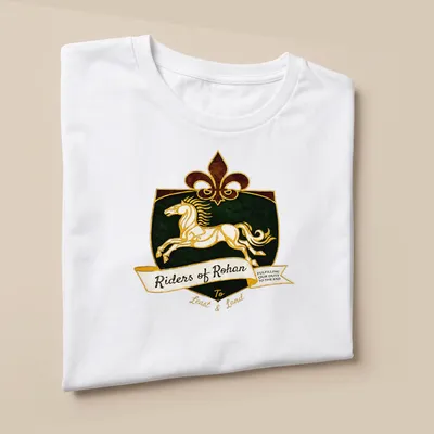 Vintage heraldic Riders of Rohan T-shirt with a white horse and bold text — printed on a unisex t-shirt (angled view)