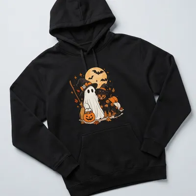 Cute cartoon Rottweiler ghost with a witch hat in black, orange, and white. — printed on a unisex hoodie