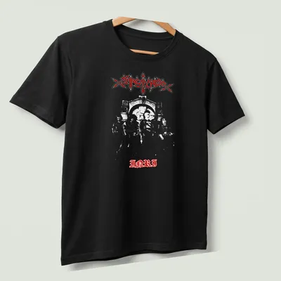Bold gothic Sarcófago I.N.R.I logo in white on a red background — printed on a unisex t-shirt (angled view)