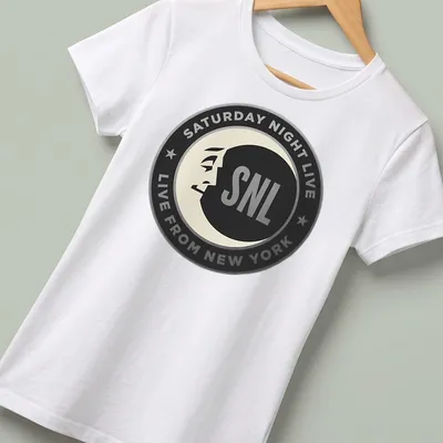 Moon face logo featuring Saturday Night Live SNL text in black and gray. — printed on a women's shirt