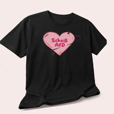 Kawaii cartoon heart design with bold text "Scheiß AfD" in pink tones. — printed on a unisex t-shirt (angled view)