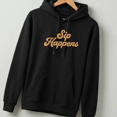 Bold script t-shirt with the humorous quote Sip Happens in gold on black background — printed on a unisex hoodie
