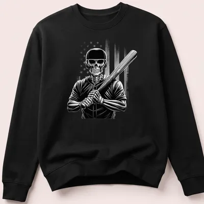Distressed graphic of a skeleton baseball player swinging a bat with an American flag theme — printed on a unisex sweatshirt