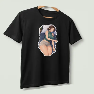 Anime girl sleeping under a blanket in cozy colors — printed on a unisex t-shirt (angled view)