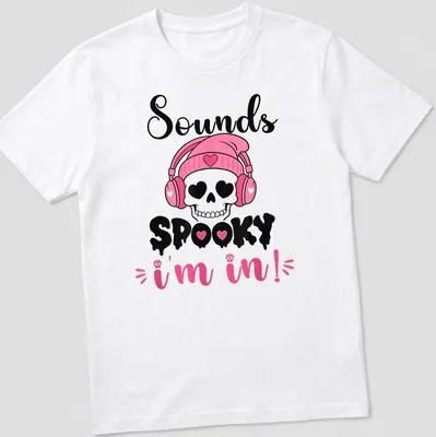 Cartoon skull with headphones and text 'Sounds Spooky I'm in!' in pink, black, and white — printed on a unisex t-shirt