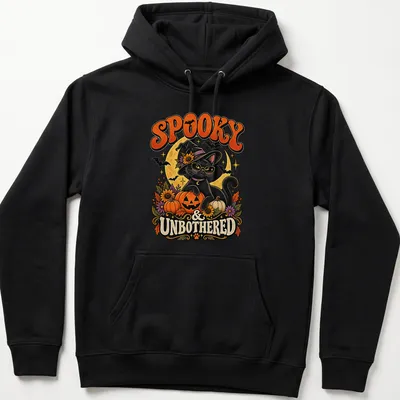 Vintage illustration of a black cat witch with the text 'Spooky & Unbothered' — printed on a unisex hoodie