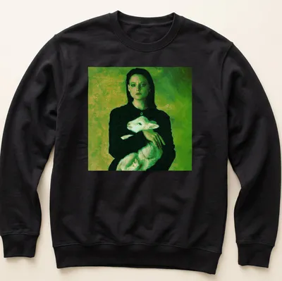 Vintage style t-shirt of a woman holding a lamb in green, black, and white — printed on a unisex sweatshirt