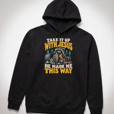 Vintage distressed Raccoon tee with humorous text about embracing individuality — printed on a unisex hoodie