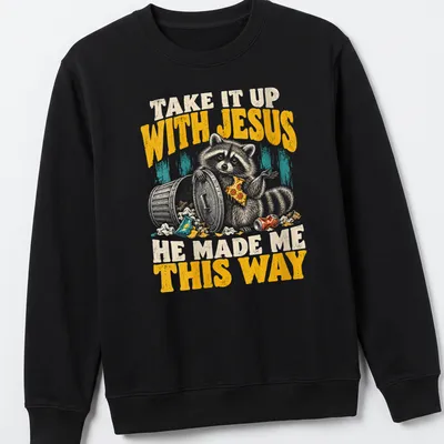 Vintage distressed Raccoon tee with humorous text about embracing individuality — printed on a unisex sweatshirt