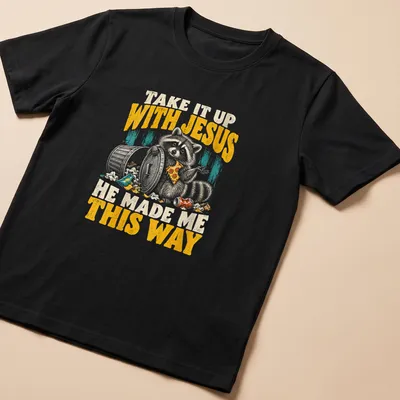 Vintage distressed Raccoon tee with humorous text about embracing individuality — printed on a unisex t-shirt