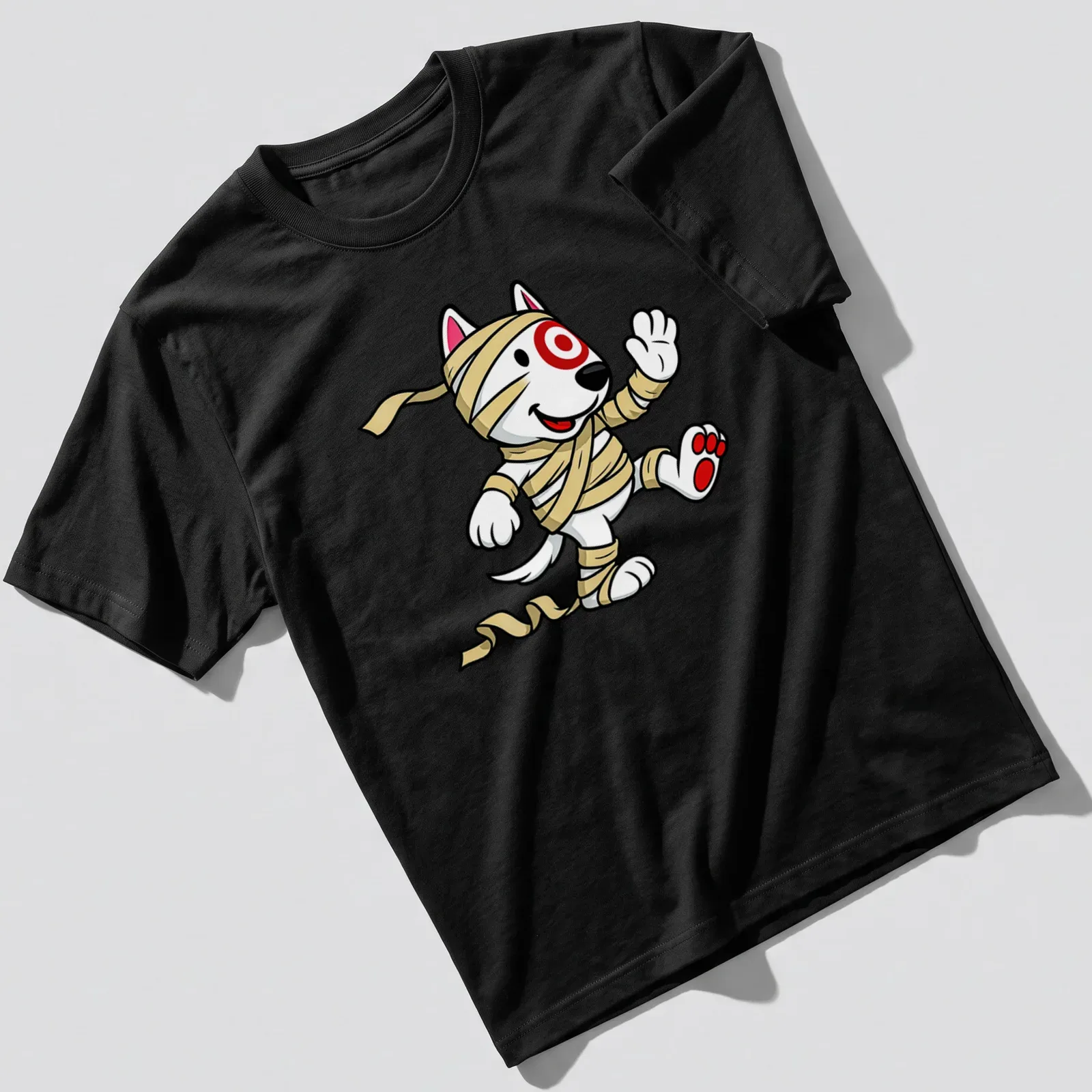 Cartoon mummy dog t-shirt with bandages and playful colors — printed on a unisex t-shirt