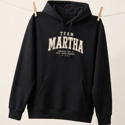 Collegiate style Team Martha shirt with biblical reference in beige and cream — printed on a unisex hoodie