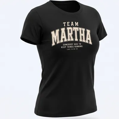 Collegiate style Team Martha shirt with biblical reference in beige and cream — printed on a women's shirt