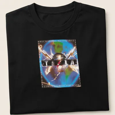 Vibrant graphic featuring Tesla logo with electric sparks in multiple colors — printed on a unisex t-shirt