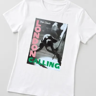 Vintage concert poster style t-shirt featuring The Clash guitarist in pink, green, black and white — printed on a women's shirt