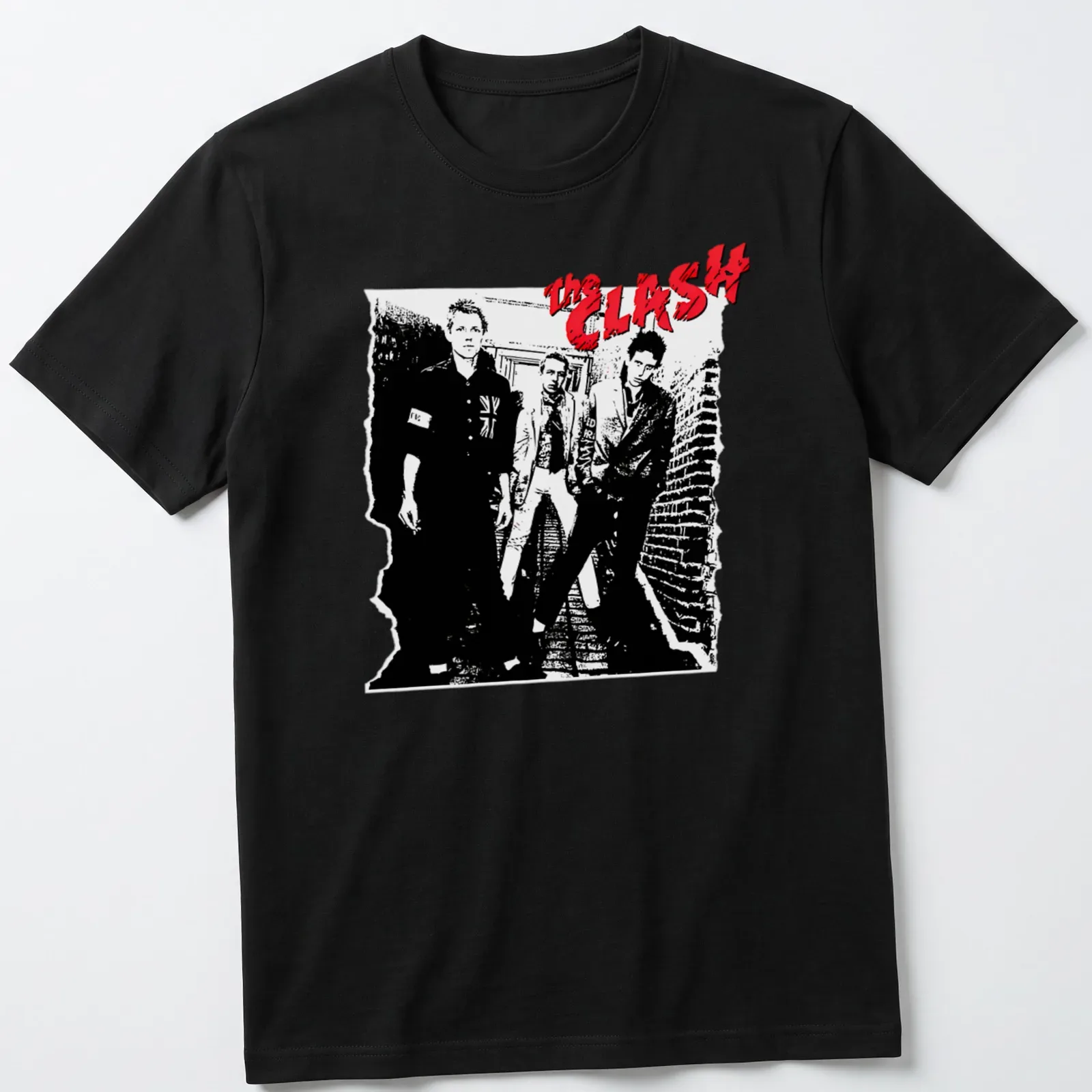 The Clash band name in bold black and white graphic with red accents — printed on a unisex t-shirt