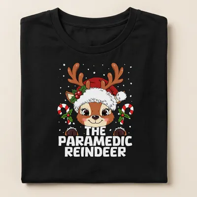 Kawaii design featuring a cute reindeer with a medical kit and festive colors. — printed on a women's shirt
