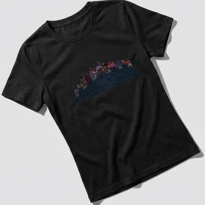 Illustration of animated gargoyles in front of a castle, featuring various colors. — printed on a women's shirt