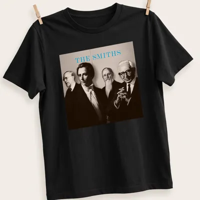 Sepia portrait of four figures with the text 'THE SMITHS' in light blue
