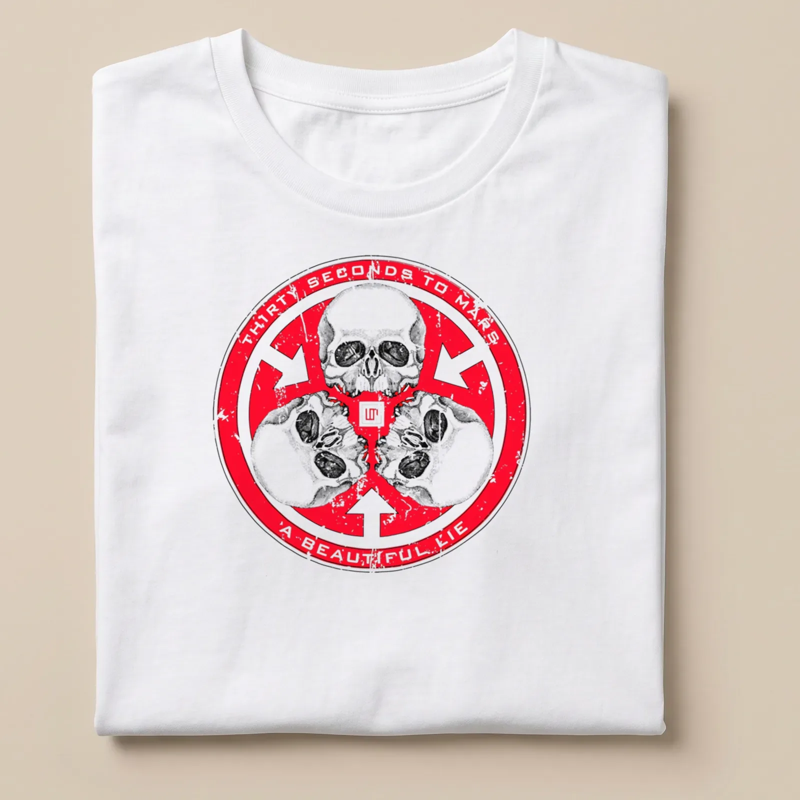Distressed T-shirt featuring three skulls and the text Thirty Seconds to Mars A Beautiful Lie — printed on a unisex t-shirt
