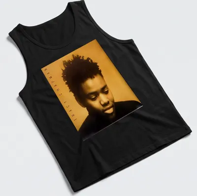 Photographic portrait of Tracy Chapman with her name beneath in bold lettering — printed on a tank top