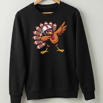 Cartoon turkey playing football in brown, orange, and red colors — printed on a unisex sweatshirt