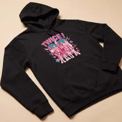 Retro T-shirt featuring the Kpop girl group TWICE! in playful typography with vibrant colors — printed on a unisex hoodie
