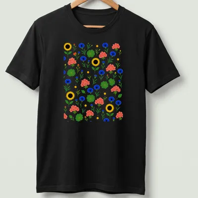 Colorful floral pattern featuring sunflowers and cornflowers in vibrant colors — printed on a unisex t-shirt