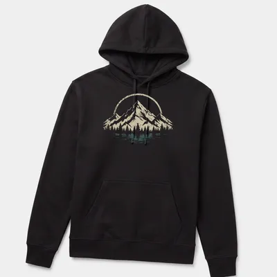 Retro distressed t-shirt featuring mountains and trees in beige, white, and dark teal — printed on a unisex hoodie
