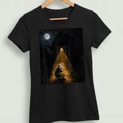 Opossum with pumpkin bucket in a spooky night scene for Halloween — printed on a women's shirt
