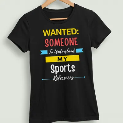Fun t-shirt featuring the text 'WANTED: SOMEONE MY' in bold colors — printed on a women's shirt