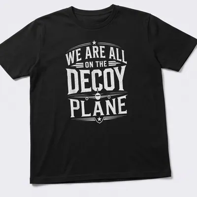 Vintage distressed t-shirt featuring humorous text about a decoy plane and aircraft illustration.