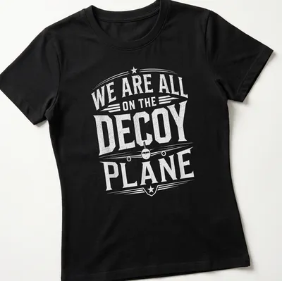 Vintage distressed t-shirt featuring humorous text about a decoy plane and aircraft illustration. — printed on a women's shirt