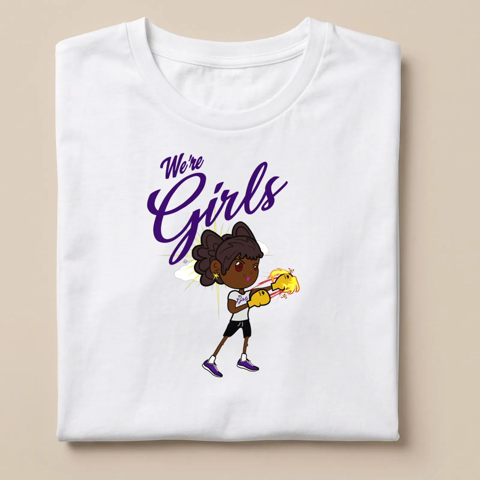 Cartoon boxer girl with gloves, playful text We're Girls in fun colors — printed on a unisex t-shirt